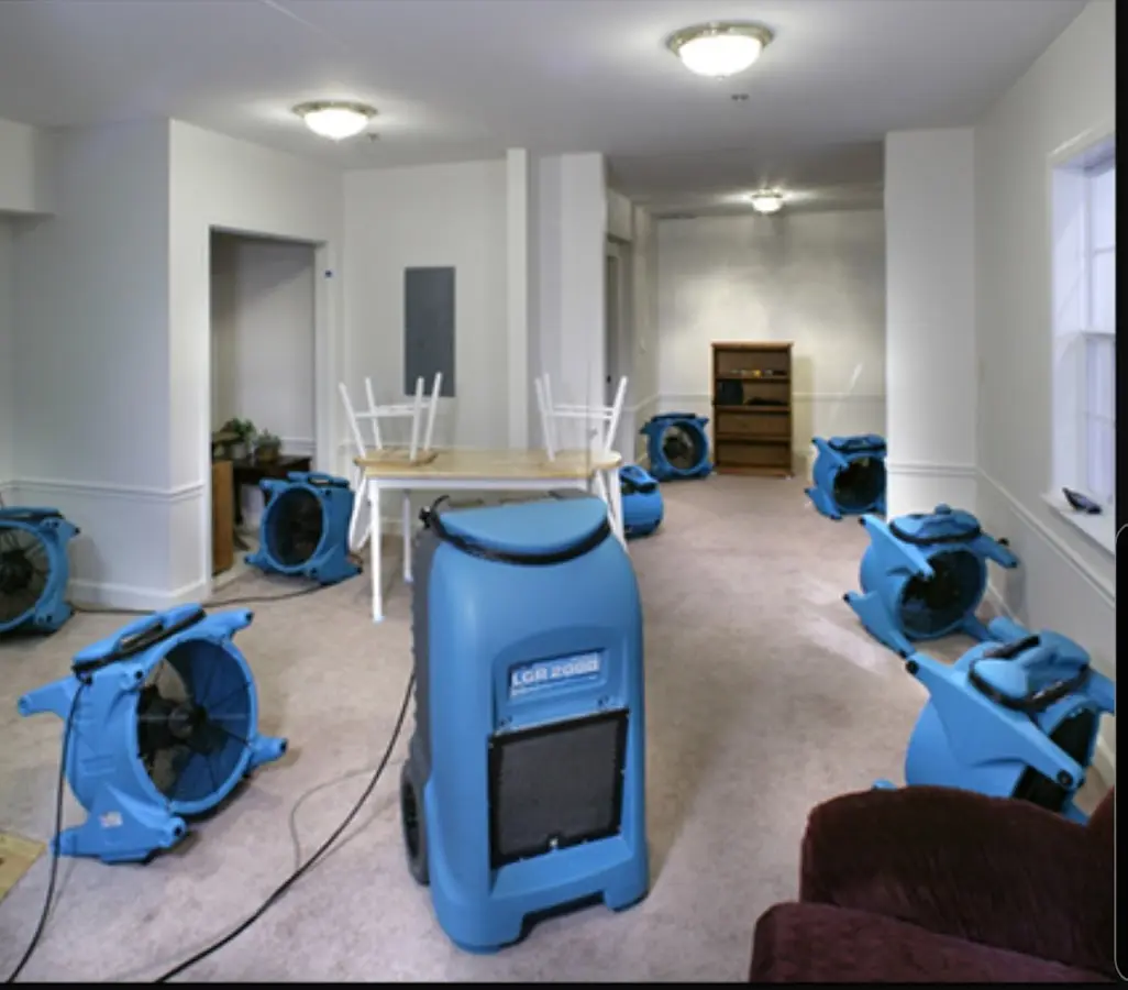 Air movers and dehumidifier setup for Water Damage Restoration in Plymouth